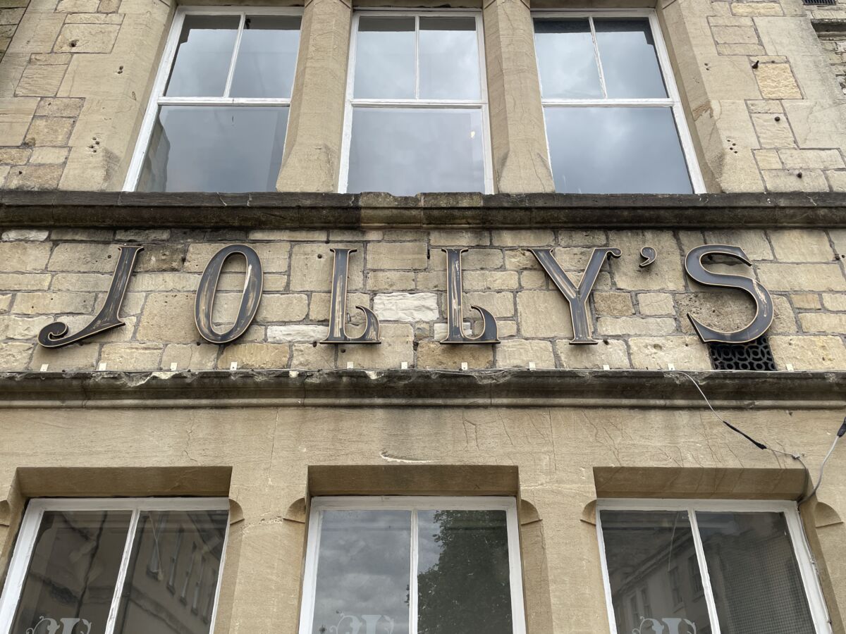 Jolly's Department Store sign on John Street in Bath, England
