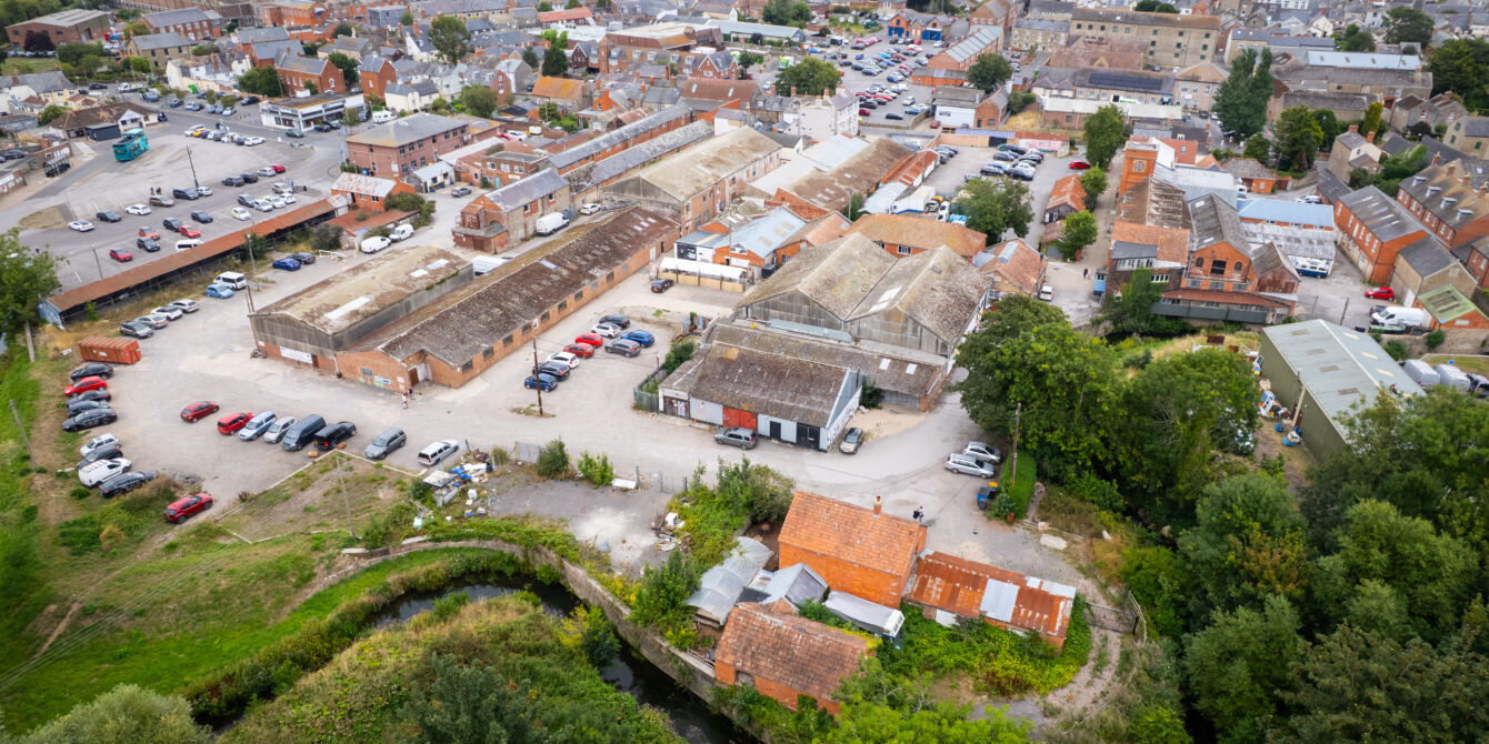 Regeneration Regeneration. A drone image of the St Michael's Bridport Trading Estate in Bridport, Dorset.